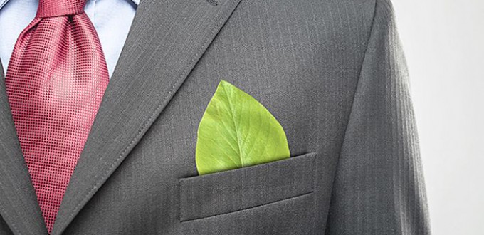 Ecology concept, businessman keeping a green leaf in his pocket